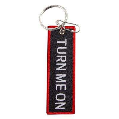 Turn Me On Embroidered Woven Key Chain